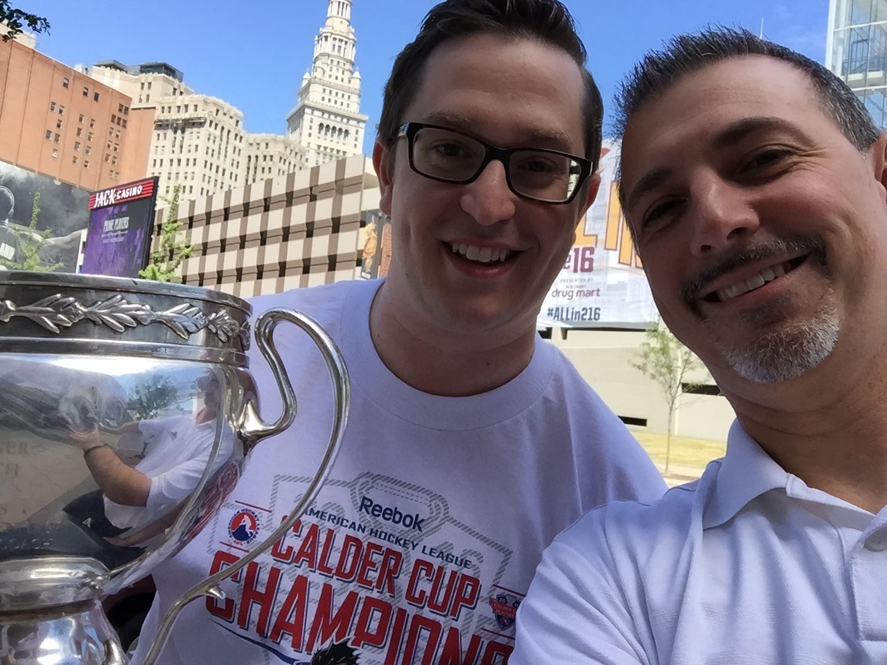 MIKE OSTROWSKI & TONY BROWN SMILE WITH TROPHY